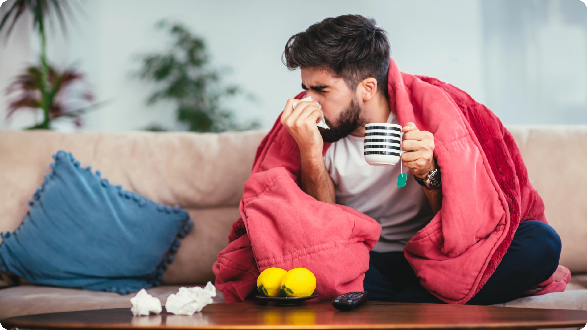 Man with a cold sneezing