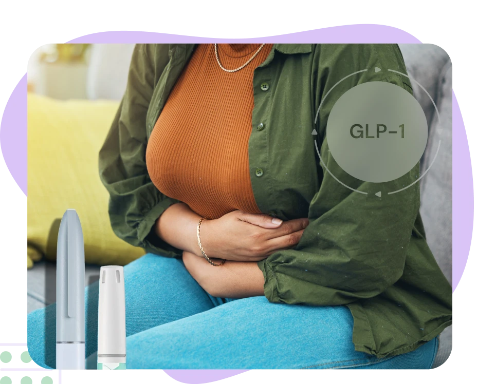 Woman holding stomach suffering from bloating due to GLP-1 treatment